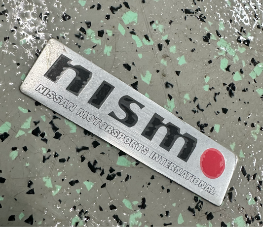 Nismo Mid Logo Trunk Emblem - NOS (out of plastic)