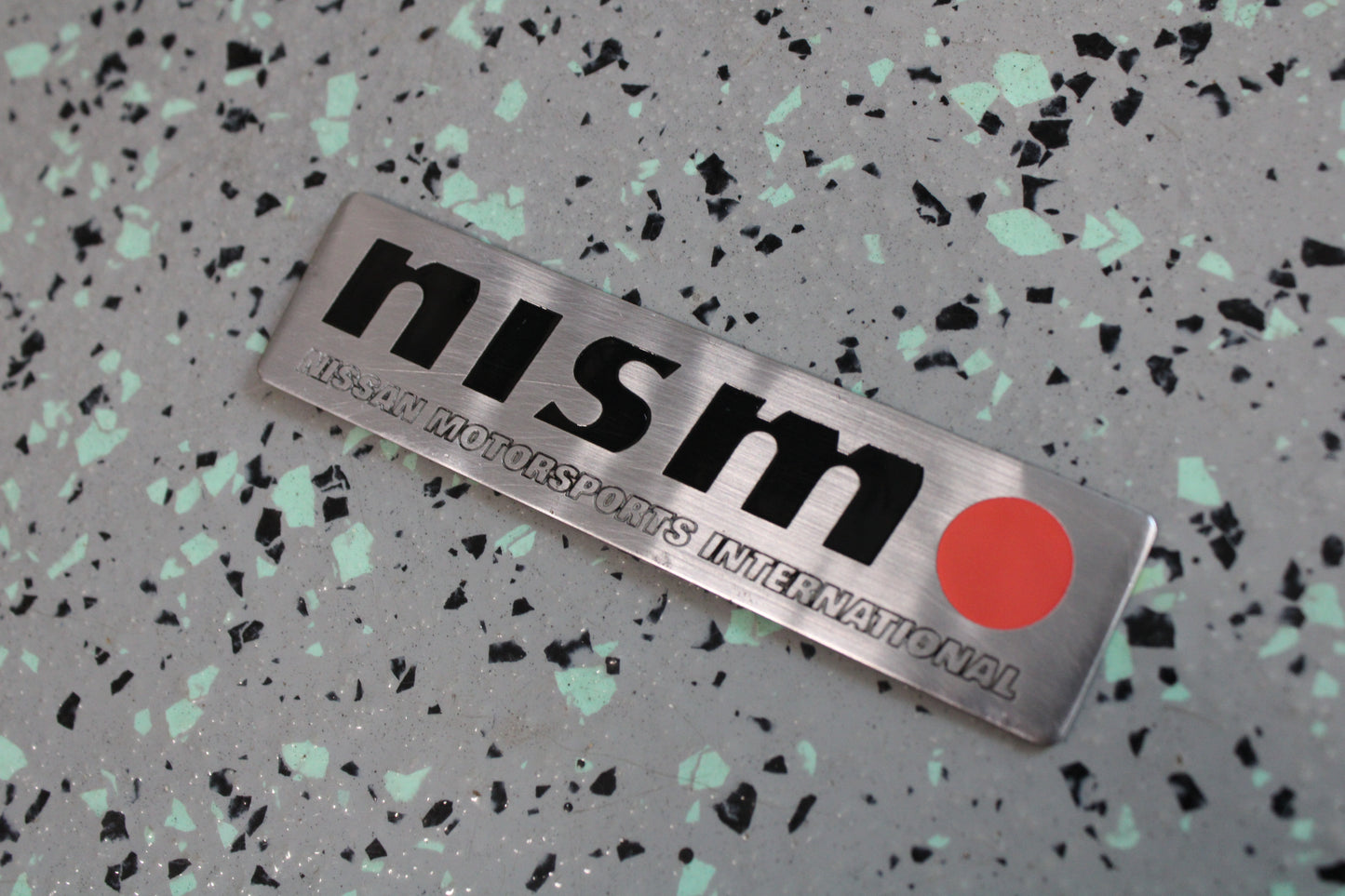 Nismo Mid logo trunk emblem - Used